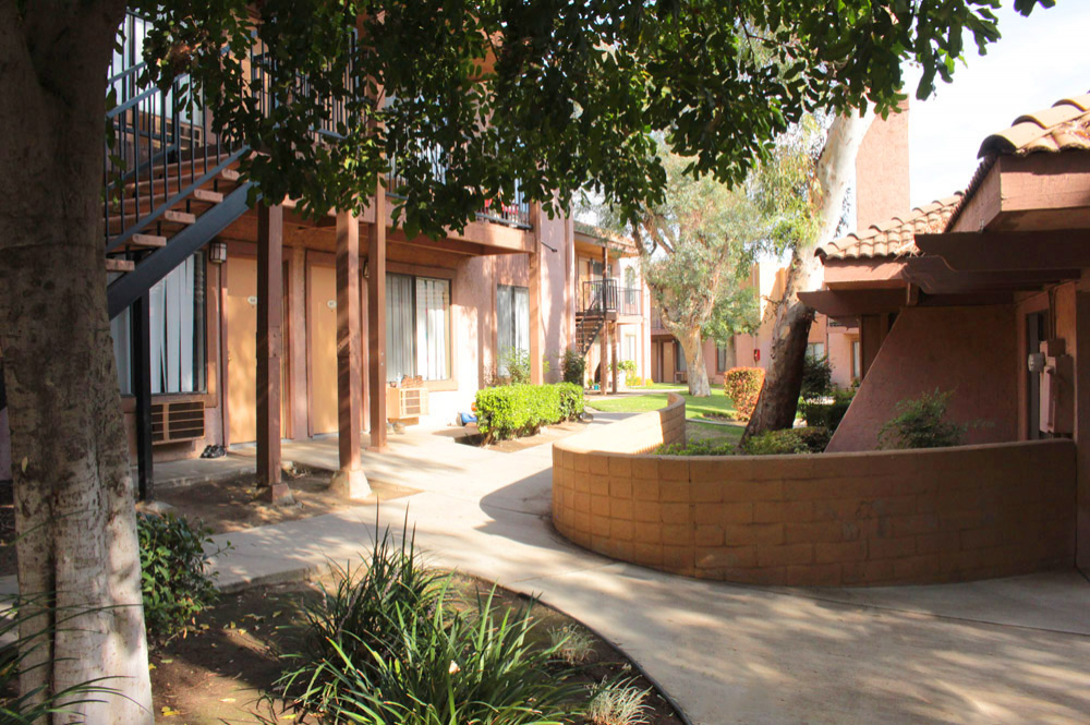 This Exteriors 5 photo can be viewed in person at the Laurel Palms Apartments, so make a reservation and stop in today.