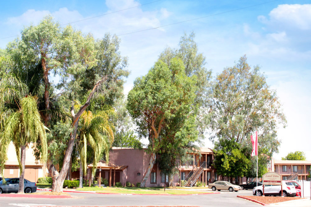 This Exteriors 1 photo can be viewed in person at the Laurel Palms Apartments, so make a reservation and stop in today.